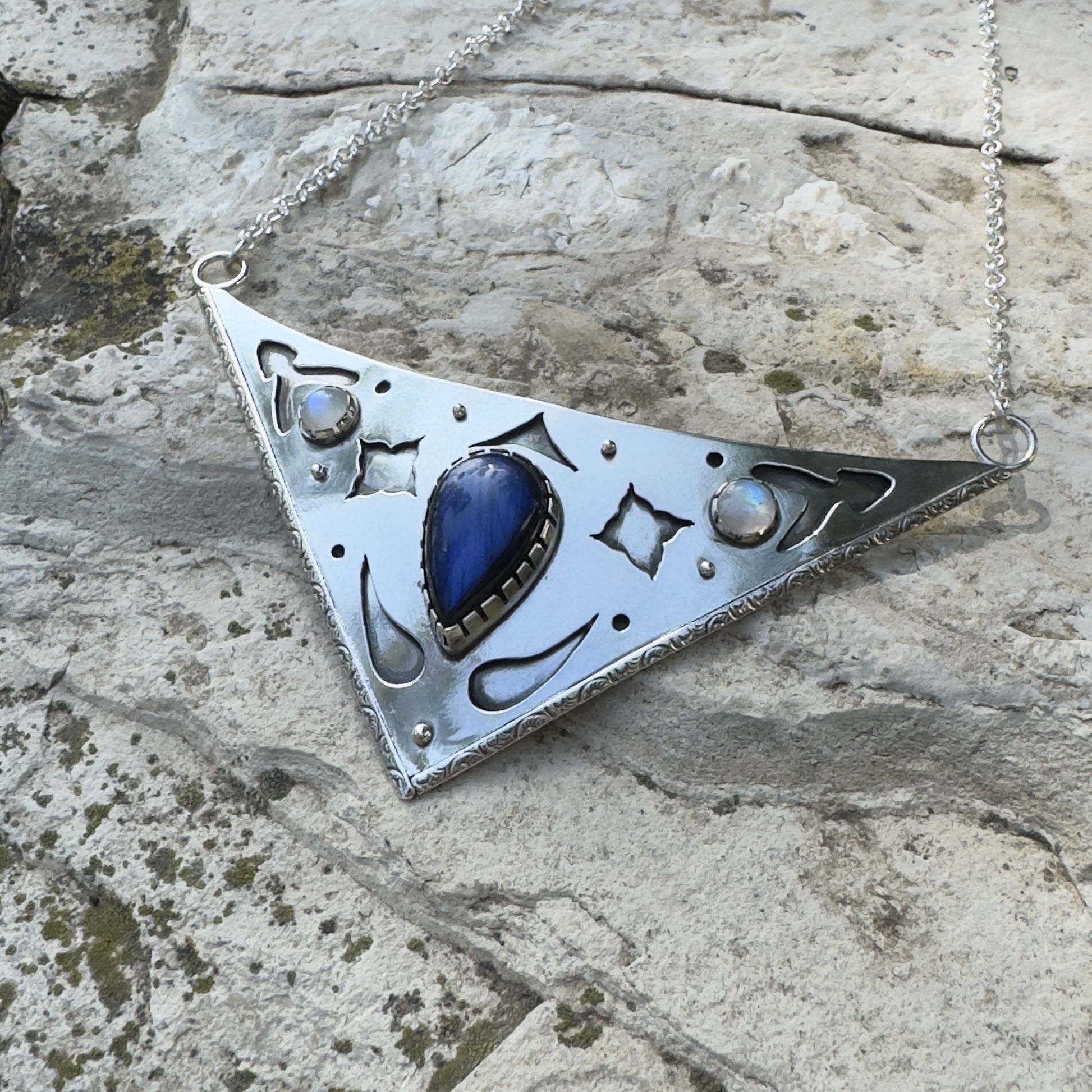 photo of a labradorite collar silver necklace with moonstone