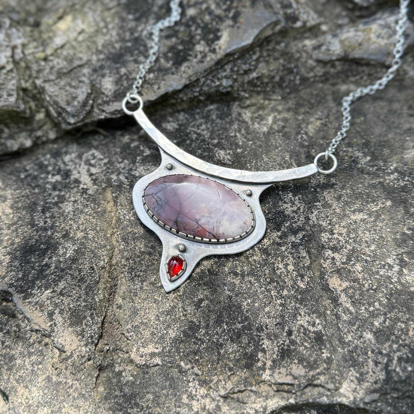 photo of a sci-fi jasper and garnet silver necklace 